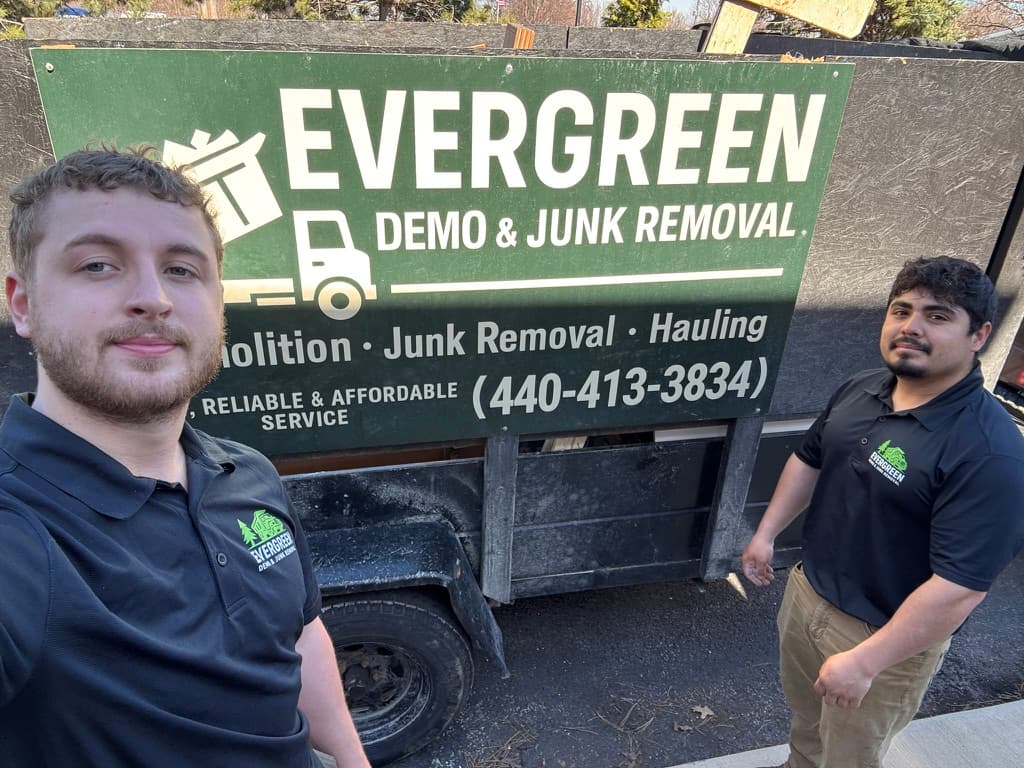 Evergreen Demo & Junk Removal team with branded truck in Willoughby, Ohio